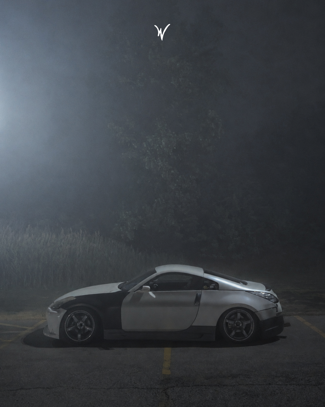 wickd poster - 350z fog parking lot